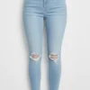 Pantalón vaquero skinny azul roto por las rodillas